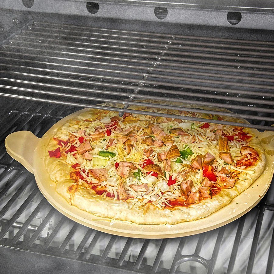 Louisiana Grills 15-inch pizza stone with a cooked pizza on a Louisiana grill