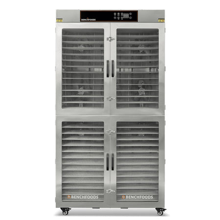 Exterior front view of the BenchFoods 28CUDG 28-tray 2-zone commercial dehydrator with closed tempered glass observation doors revealing empty mesh shelving.