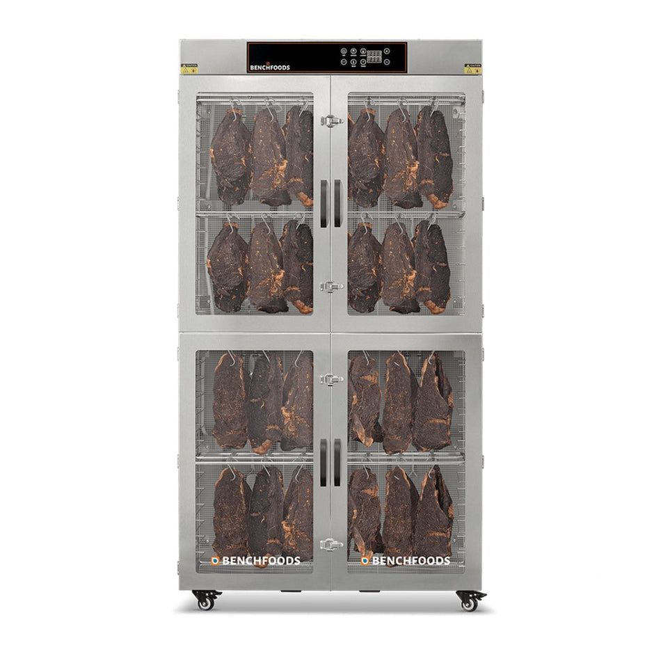 Front view of the BenchFoods 28CUDG commercial dehydrator biltong bundle with closed glass doors showing large cuts of meat hanging from internal curing hooks.
