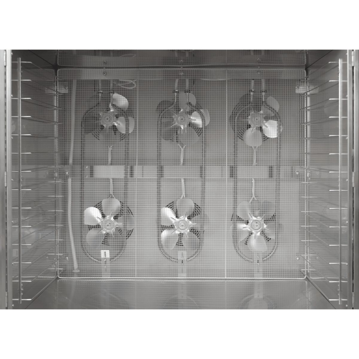 Interior view of an empty processing cabinet in the BenchFoods 28CUDG biltong bundle dehydrator showing the high-velocity rear-mounted circulation fans.