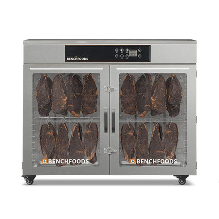 BenchFoods 32HCUDG biltong bundle horizontal commercial dehydrator front view with closed doors showing biltong hanging in both zones