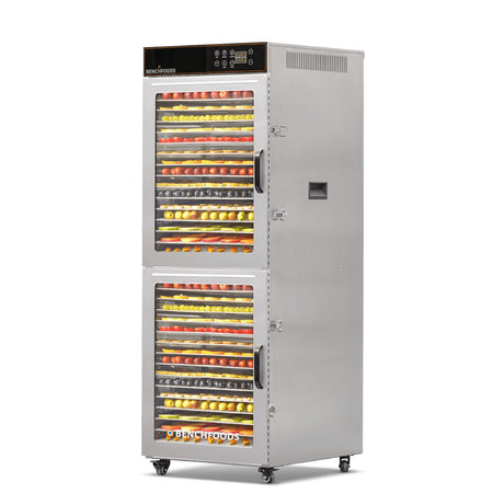 BenchFoods 32VCUDG vertical commercial dehydrator angled view with dehydrated fruit trays loaded