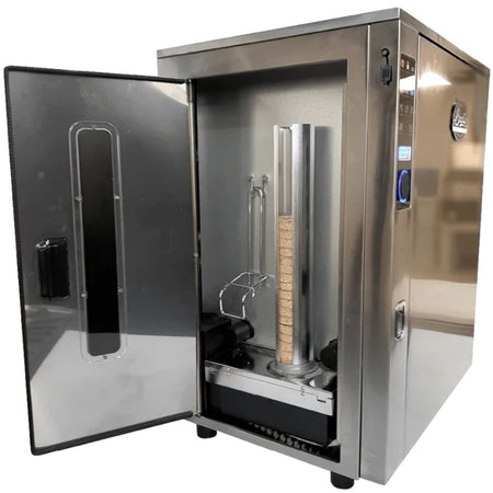 Side door of the Bradley Smoker P10 open, showing the puck loading system and smoker internals
