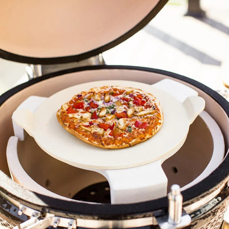 Durable ceramic pizza stone by Louisiana Grills, designed for high-heat cooking and even browning