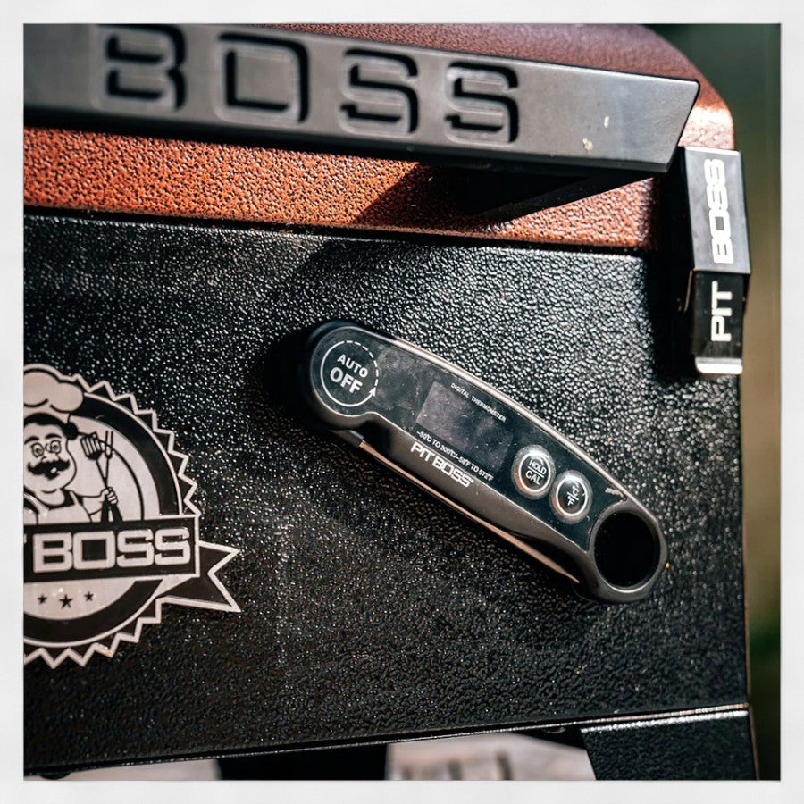 Digital thermometer by Pit Boss, featuring a clear display and foldable probe