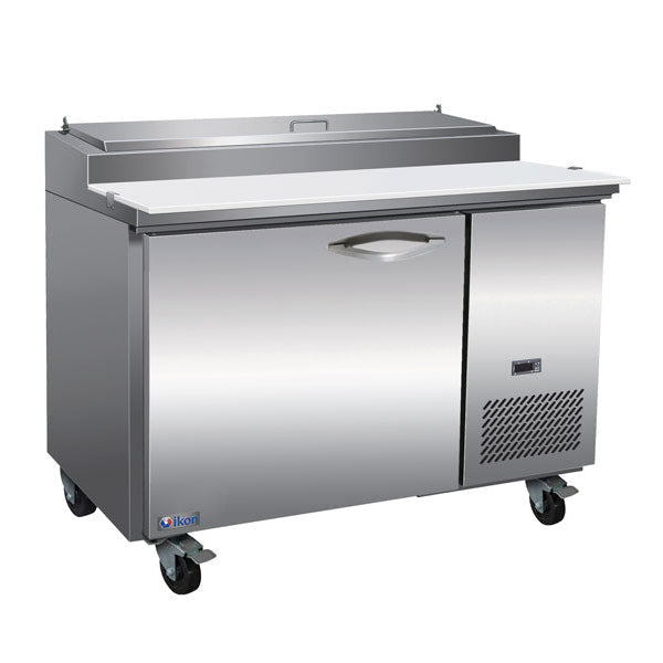 IKON IPP47 47-inch refrigerated pizza prep table with stainless steel doors, cutting board, and topping rail
