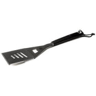 Angled view of Jackson Grills stainless steel grill flipper with serrated edge and bottle opener