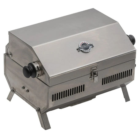 Rear-left angled view of the Jackson Grills VERSA 50 portable grill with folded legs