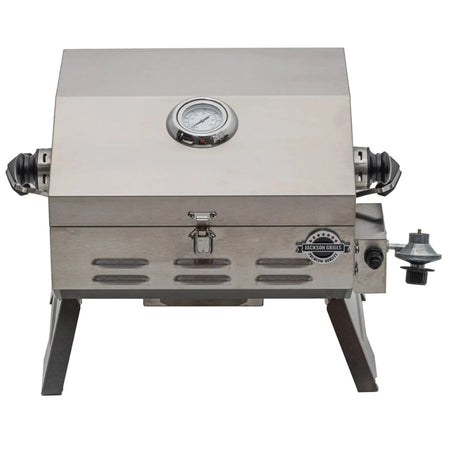 Front view of the Jackson Grills VERSA 75 portable stainless steel gas grill with lid closed