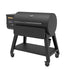 Louisiana Grills 1200 Black Label Series Grill, angled view displaying the sleek black design, pellet hopper, and sturdy construction.