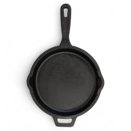 The bottom of the Pit Boss 12-inch Cast Iron Deep Skillet's lid, showing a ridged, griddle-like surface