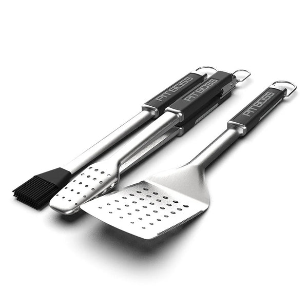 Pit Boss 3-Piece BBQ Tool Set, including a large spatula, tongs, and a basting brush, all with rosewood handles.