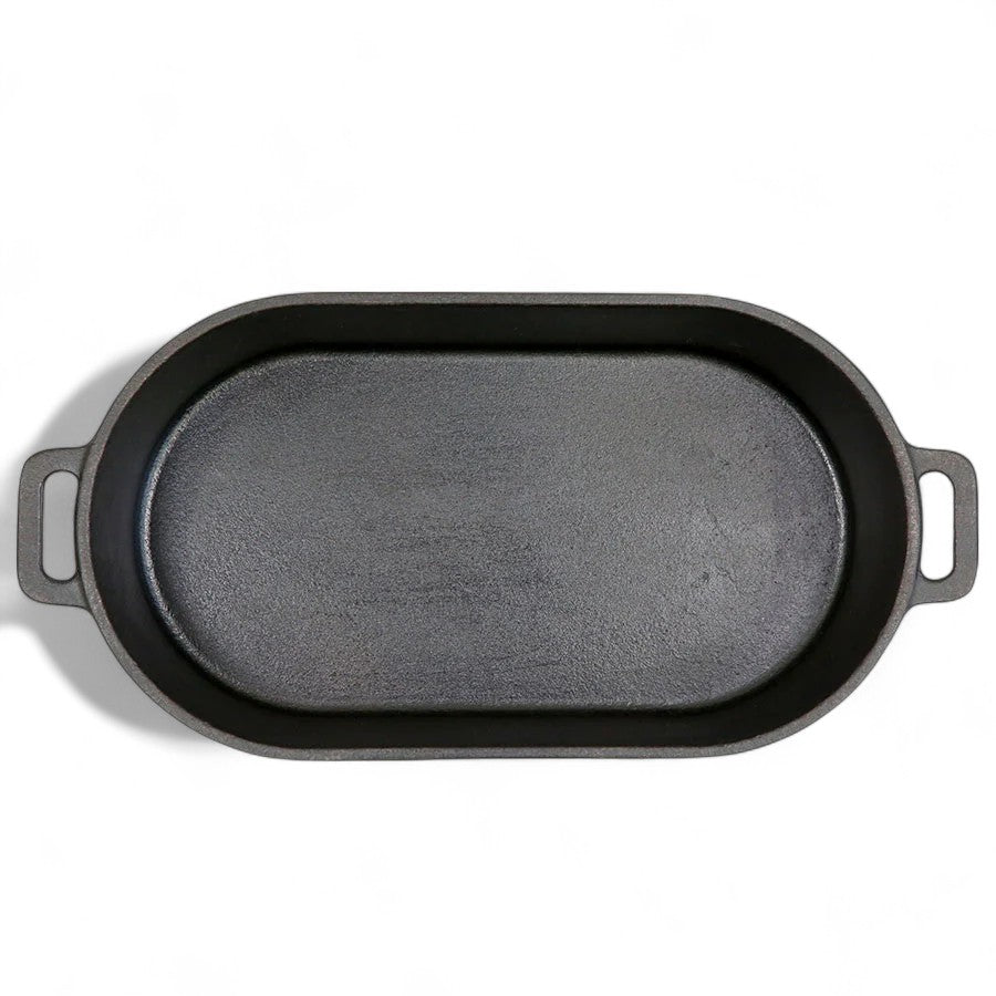 Pit Boss 6-quart Cast Iron Roaster with the lid removed, displaying the interior