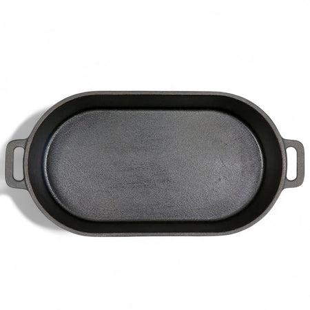 Pit Boss 6-quart Cast Iron Roaster with the lid removed, displaying the interior