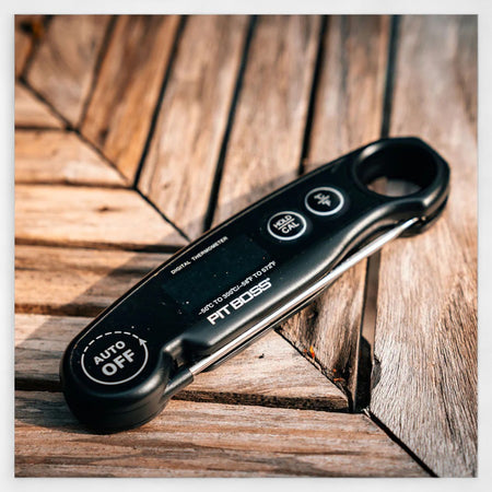 Digital thermometer by Pit Boss, featuring a clear display and foldable probe