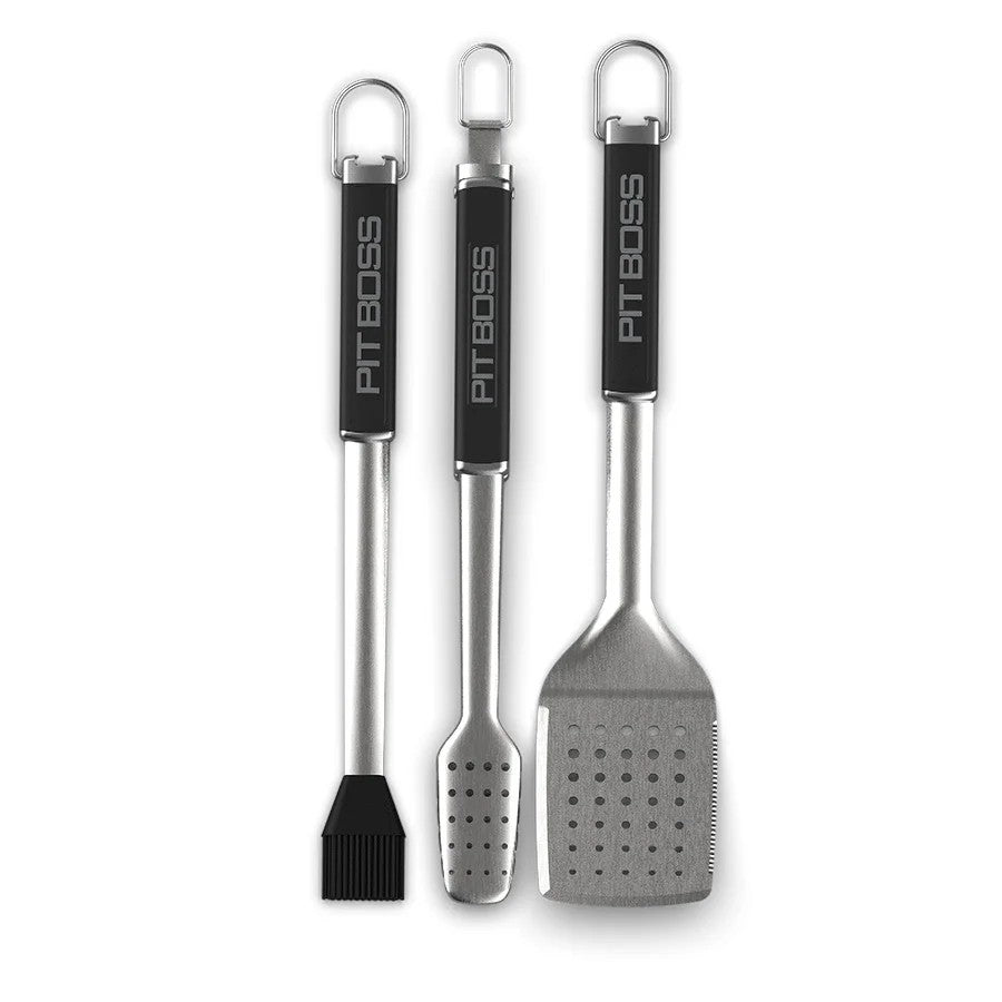 Pit Boss BBQ tool set: spatula with a serrated edge, locking tongs, and a basting brus