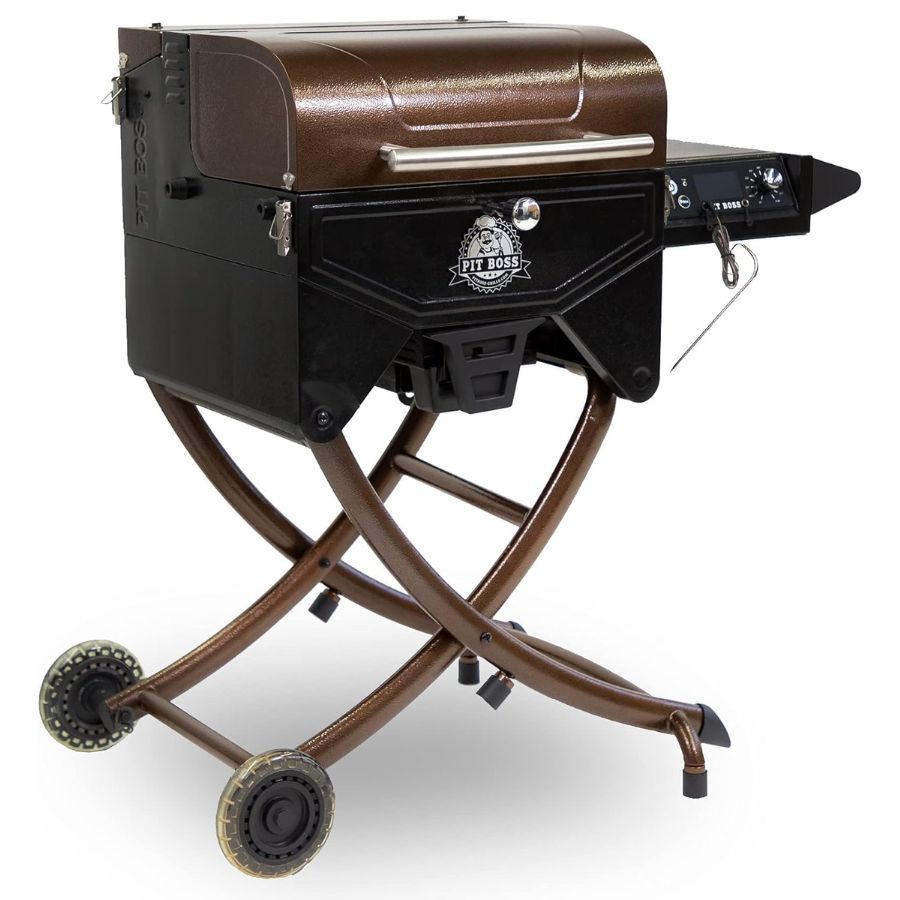 Angled side view of Pit Boss Mahogany 260 Portable Wood Pellet Grill showing foldable legs and wheels