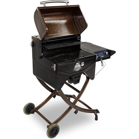 Mahogany 260 Portable Wood Pellet Grill with lid open showing porcelain-coated cast iron cooking grates