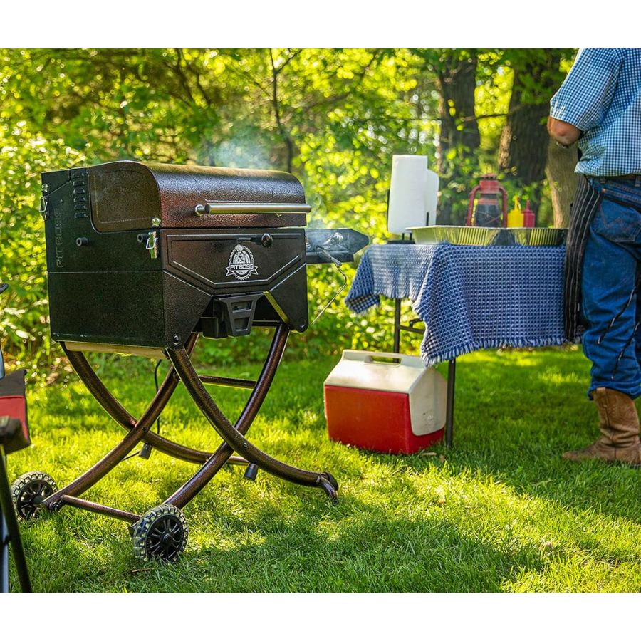 Pit Boss Mahogany 260 Portable Wood Pellet Grill in backyard barbecue scene