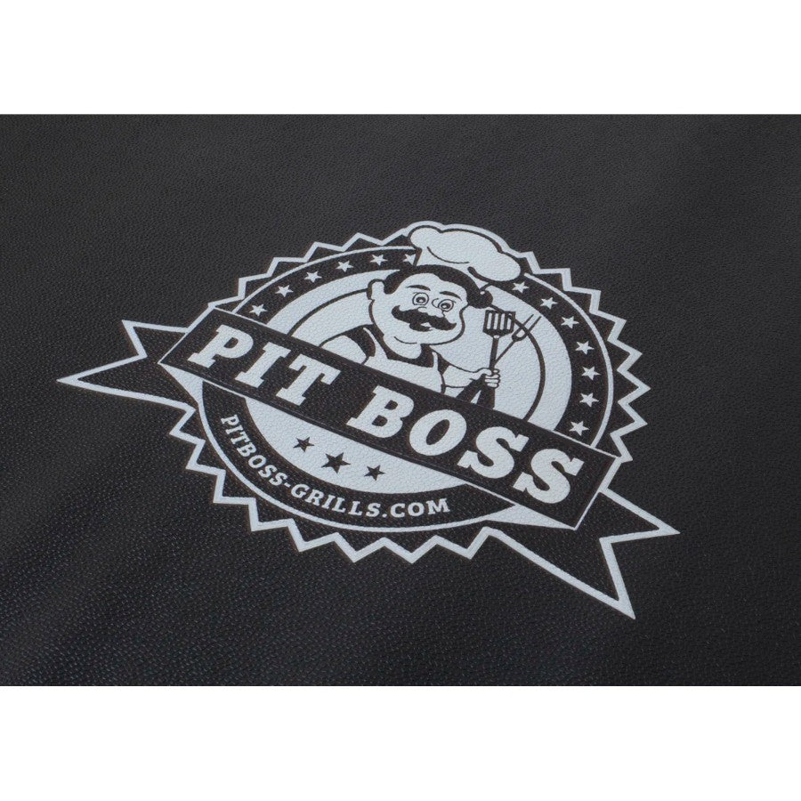 A close-up of the Pit Boss logo on the black BBQ grill mat