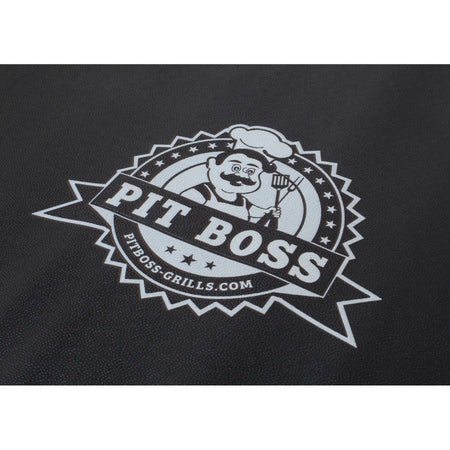 A close-up of the Pit Boss logo on the black BBQ grill mat