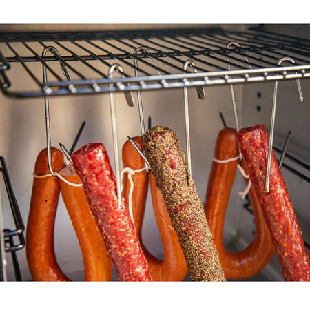 Closed up view of meat hanged using the Pit Boss meat hooks