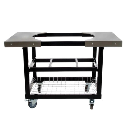 A full view of the Primo Ceramic Grills Cart Base with Basket & Stainless Side Shelves, with a ceramic grill placed on top, ready for use