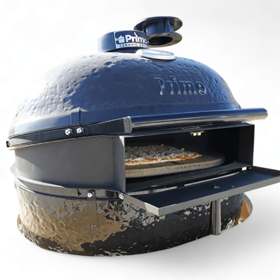 A Primo Ceramic Grills Pizza Oven insert with a pizza inside, ready for cooking, showing the dark ceramic material